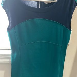 Beautiful top in great condition, comfortable and nice color. Fits true to size.